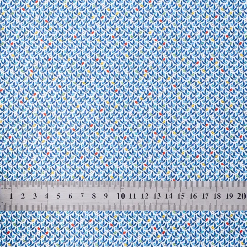 'Sea of Leaves' fabric swatch with ruler for size reference